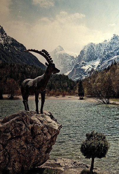 The bronze ibex at Jasna Lake, Dinaric Alps, Slovenia